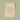 A small cream-colored fabric drawstring pouch with gold foil text reading 'A Sprinkle of Christmas Magic for the 1st December', set against a solid sage green background.