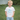 Child wearing a 'Big Bro.' shirt outdoors on grass