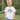 Child wearing a 'Big Brother In Training' shirt outdoors