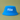 A bright blue bucket hat with the name 'Mila' written in white cursive script on the front, set against a solid olive green background.