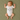 Baby wearing a onesie with 'Baby WILLIAMS' printed on it, lying on a green textured surface.