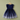 A navy blue toddler girl's dress with a solid navy bodice, ruffled cap sleeves, and a flared tulle skirt decorated with white star patterns, hanging on a wooden hanger against a sage green background.