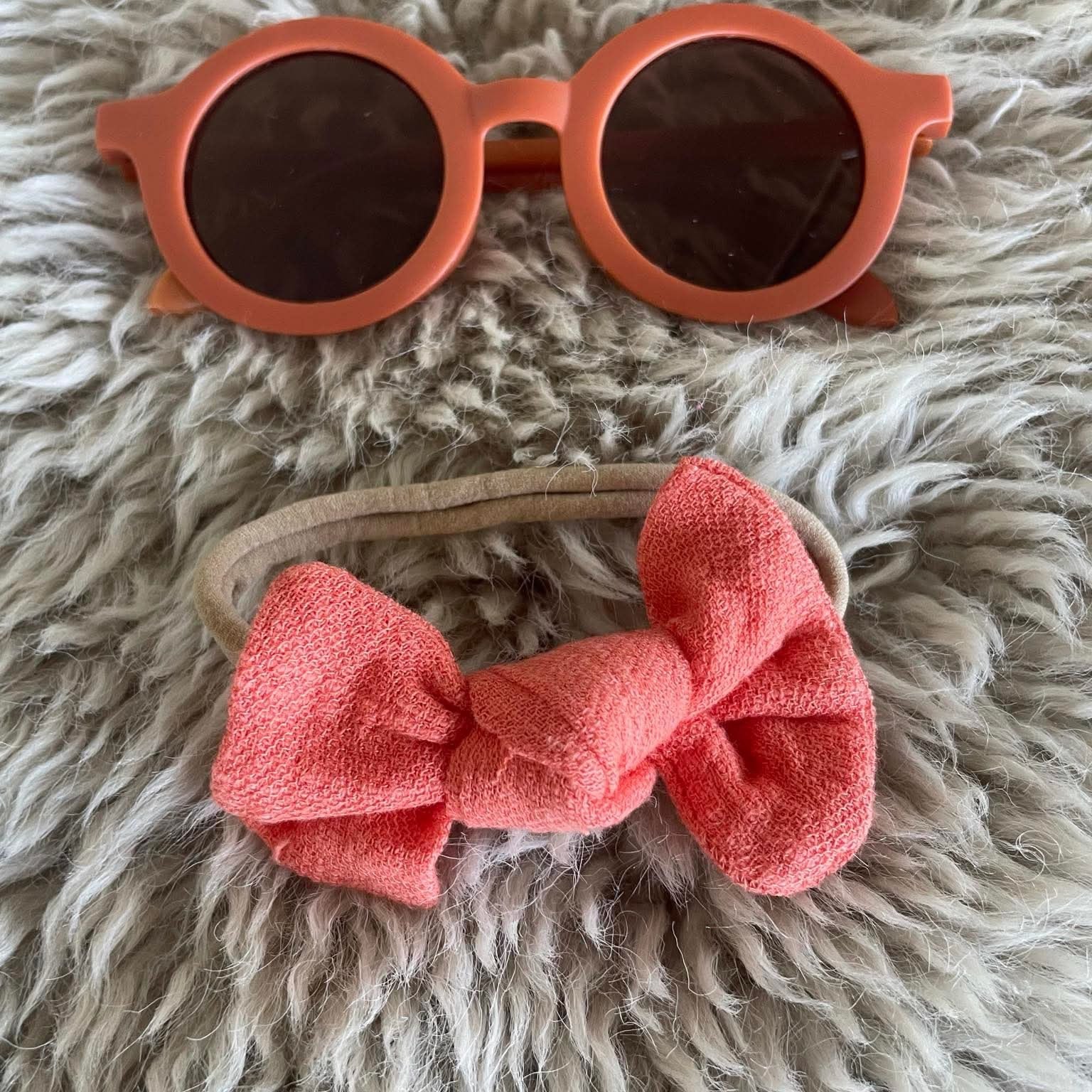 Orange sunglasses and bow