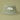A light sage green bucket hat with the name 'Mila' printed in white cursive text on the front, set against a matching sage green background.