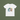White t-shirt with a shark graphic on a green background