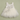 Ivory lace and tulle flower girl dress flat lay on sage background