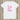 A white onesie with 'Lil Sis.' written in pink lettering.